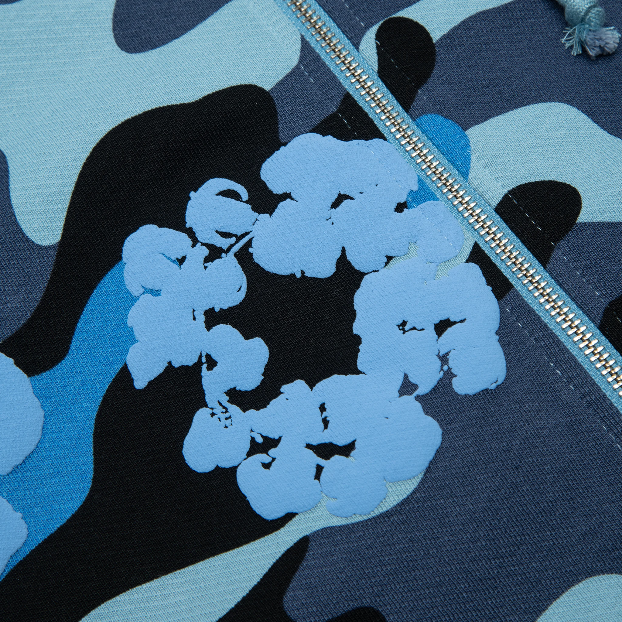 Detail view of Denim Tears Blue Camo Cotton Wreath Zip-Up Hoodie